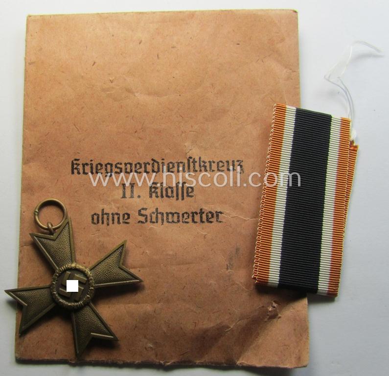 Superb medal-set: 'KvK 2. Klasse ohne Schwertern' being a non-maker-marked specimen by the maker- (ie. 'Hersteller') named: 'Jak. Bengel' and that comes packed in its original (larger-sized), 'Zellstoff'-based pouch