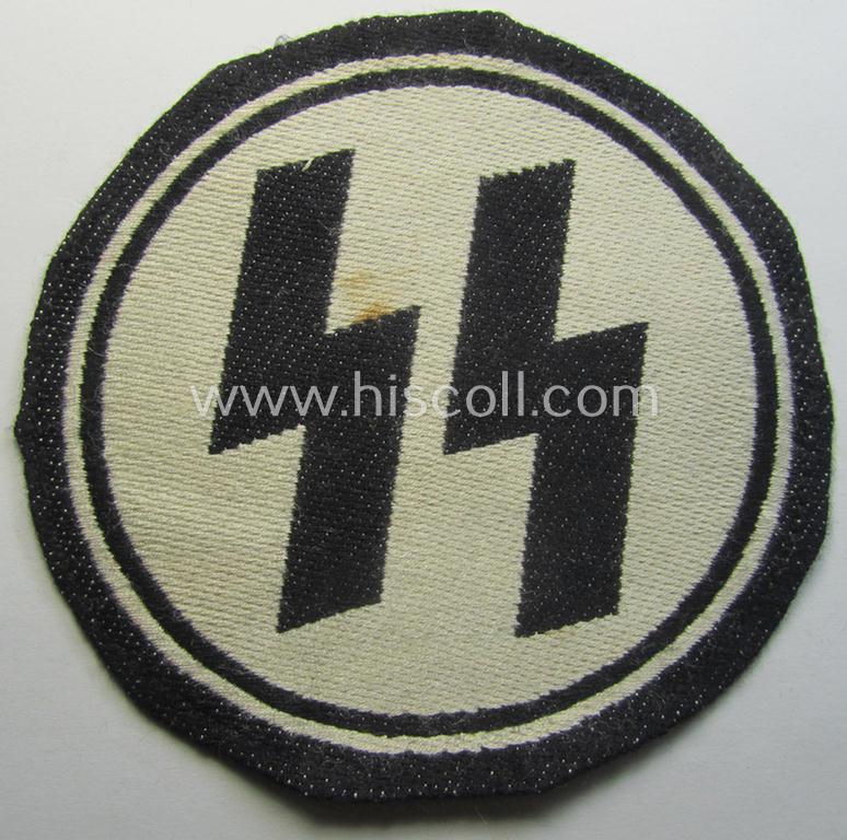 Superb, Waffen-SS sport-shirt emblem as executed in the neat 'BeVo'-weave pattern that still retains its period-attached 'RzM'-etiket and that comes in an overall very nice- (ie. 'virtually mint'-), condition