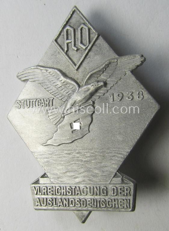 Commemorative, AO- (ie. 'Ausland Organisation'-) related 'tinnie' being a maker- (ie. 'Fr. Zimmermann' ie. 'RzM M9/42'-) marked example depicting the AO-logo and text: 'VI. Reichstagung d. Auslanddeutschen in Stuttgart - 1938'