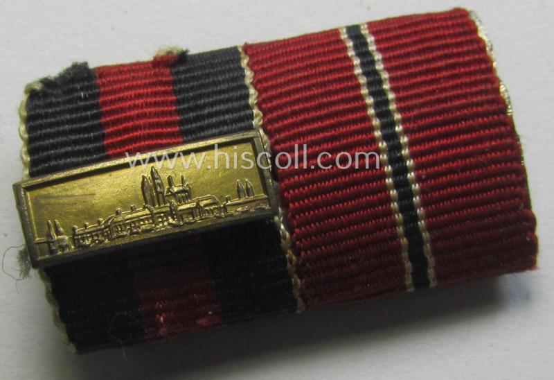 Attractive, 2-pieced WWII-period ribbon-bar (ie. 'Feld- o. Bandspange') showing resp. the ribbons for a: Czech 'Anschluss'-medal (with attached 'PB-Spange'!) and an: 'Ost'-medal