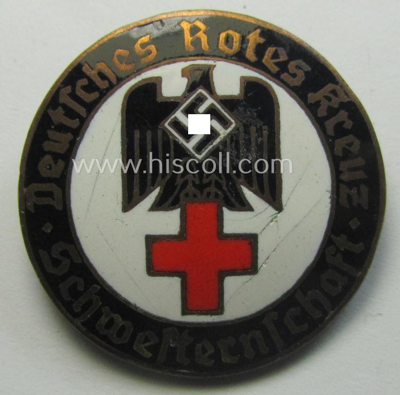 Attractive, DRK (ie. 'Deutsches Rotes Kreuz') so-called: nurses'-badge entitled: 'Schwesternschaft' being a medium-sized version showing an engraved bearers'-number: ('714'), town: ('Karlsruhe') and/or makers'-mark ('A. Stübbe - Berlin')