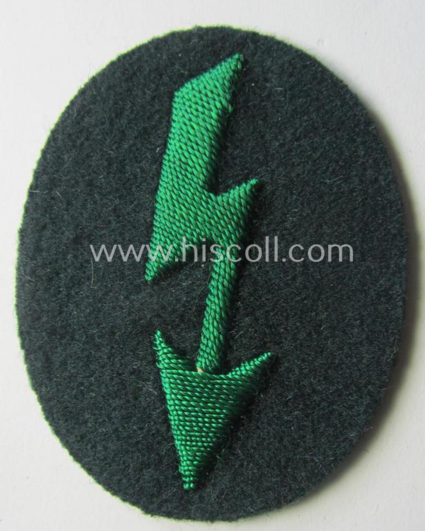 WH (Heeres) trade- and/or special-career-insignia ie. hand-embroidered 'signal-blitz' being a maker- ('D&G'-) marked example as executed in green-coloured linnen as was specifically intended for a soldier within the: 'Jäger- o. Geb.Jäger-Truppen'