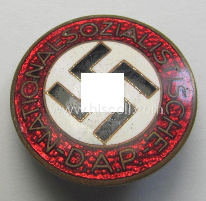 Attractive - bright-red-coloured and nicely preserved! - 'N.S.D.A.P.'-membership-pin- ie. party-badge (or: 'Parteiabzeichen') which is maker-marked on its back with the makers'-designation: 'RzM' and/or: 'M1/120'