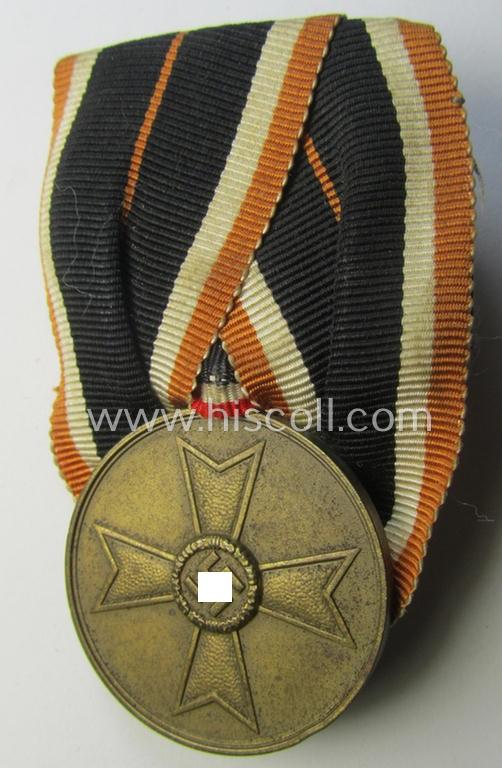 Attractive - and truly rarely found! - example of a so-called: 'Einzelspange' (ie. single-pieced medal-bar) showing a: 'Kriegsverdienstmedaille 1939' (or: war-merits-medal), being a neat 'Buntmetall'-based specimen