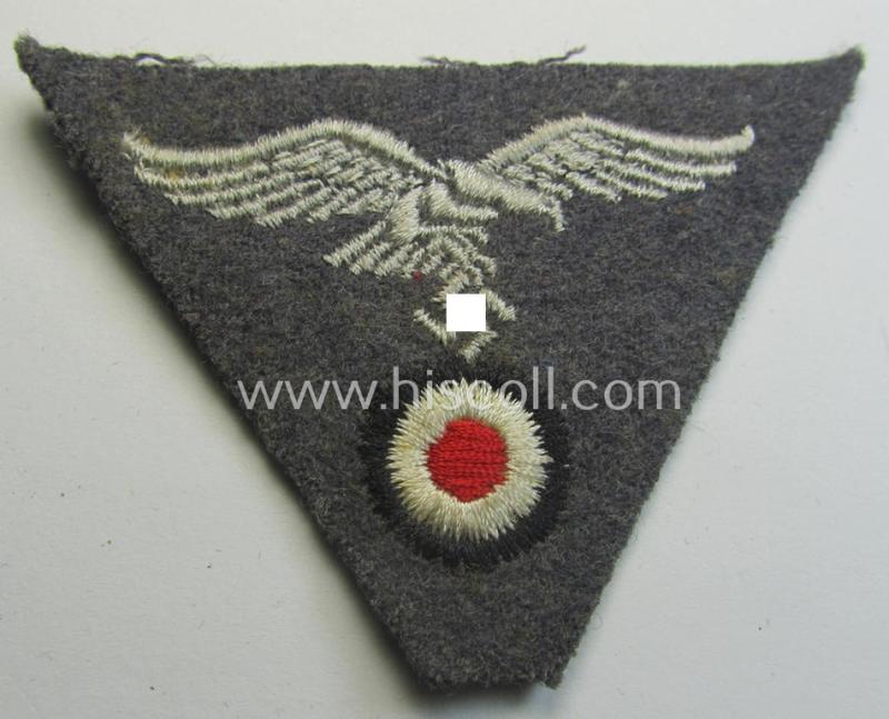 Attractive - and scarcely encountered! - WH (Luftwaffe) so-called: 'M43-pattern'-cap-trapezoid (being a machine-embroidered and 'virtually mint' example that is executed on a bluish-grey-coloured- and/or woolen-based background)