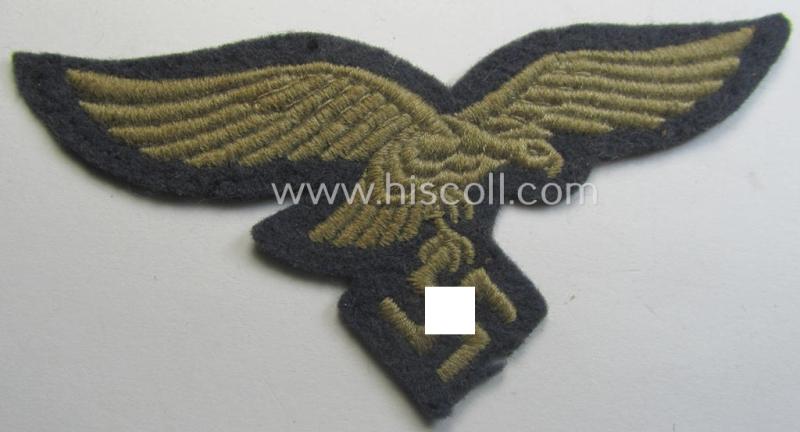 Attractive - and clearly used- ie. carefully tunic-removed! - WH (Luftwaffe) EM- (ie. eventually NCO-) type breasteagle (being a once tunic-attached example as executed in typical machine-embroidered-pattern)