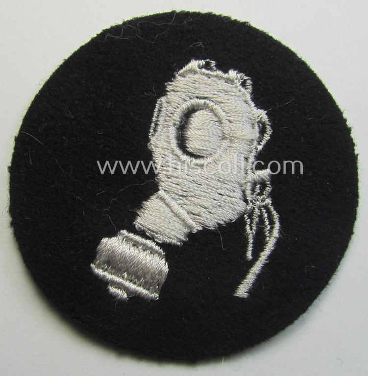 Attractive, Waffen-SS-related so-called: trade- and/or special-career arm-insignia, as was intended for a: 'Gasschutzunteroffizier' (or: gas-protection NCO) being a neatly machine-embroidered example