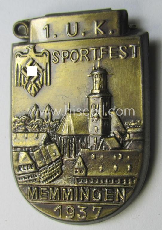 Commemorative, golden-bronze-toned sports'- (ie. 'N.S.R.L.'-) related day-badge (ie. 'tinnie' or: 'Veranstaltungsabzeichen') as was issued to commemorate participation within the: '1. U.K. Sportfest - Memmingen - 1937'