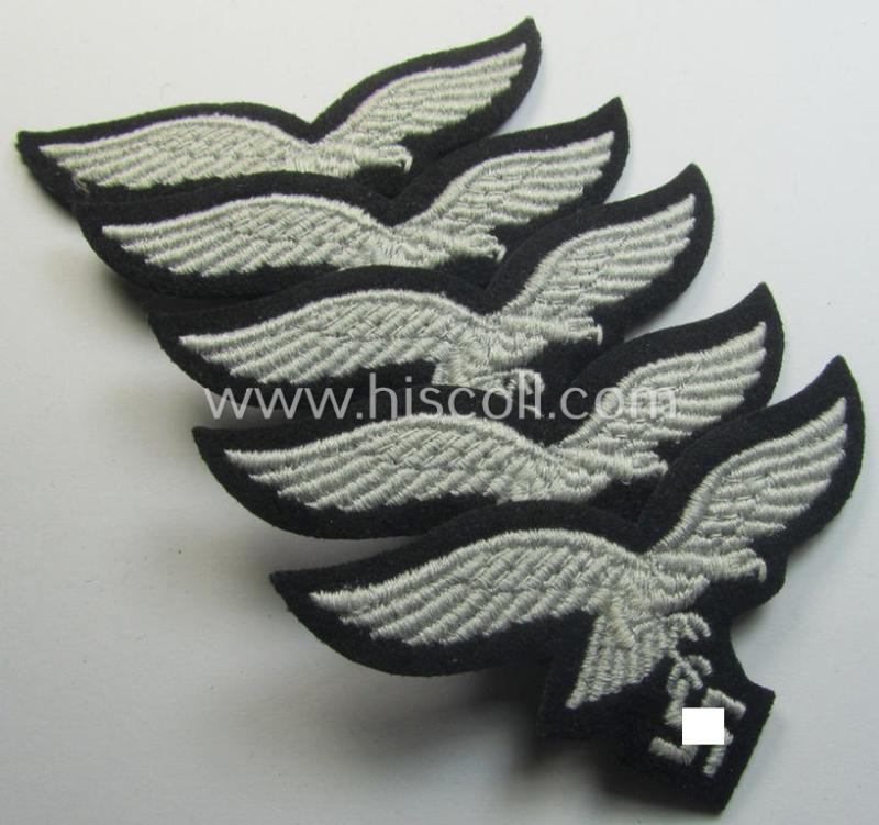 Attractive, WH (Luftwaffe) cap-eagle (being a 'standard-issue'-pattern example as executed onto a black-coloured and woolen-based  background and as such intended for usage on the black-coloured work- ie. 'HG'-related side-caps ie. 'Schiffchen')