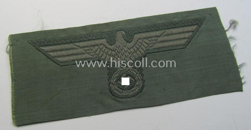 Early- (ie. mid-) war-period, WH (Heeres) cap-eagle (ie. 'Schiffchenmützen-Adler für Mannschaften u. Uffz.') being a 'virtually mint' example as executed in bluish-grey-coloured linnen on a field-grey-coloured background