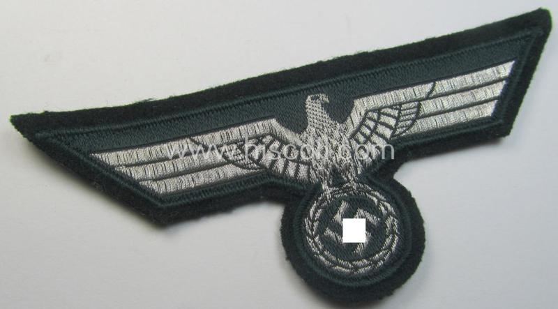 WH (Heeres) breast-eagle as executed in 'BeVo'-type-, so-called: 'flat-wire'-weave-pattern and pre-mounted on darker-green-coloured wool as was specifically intended for usage by soldiers (ie. NCOs) on their dress-tunics (ie. 'Waffenröcke')