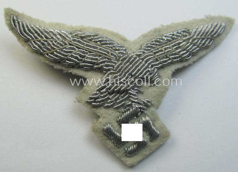 Attractive - and rarely seen! - WH (Luftwaffe) officers'-type visor-cap eagle that is neatly hand-embroidered on beige-white-coloured wool as was specifically used for the white-topped LW officers'-type visor-caps (ie. 'Sommer-Schirmmützen')