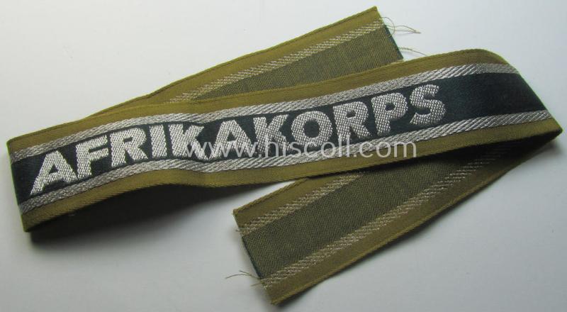 Superb, 'BeVo'-like cuff-title (ie. 'Ärmelstreifen') entitled: 'Afrikakorps' being a presumably issued but simply never worn example that comes in an overall very nice- (ie. non-shortened- and never tunic-attached-), condition