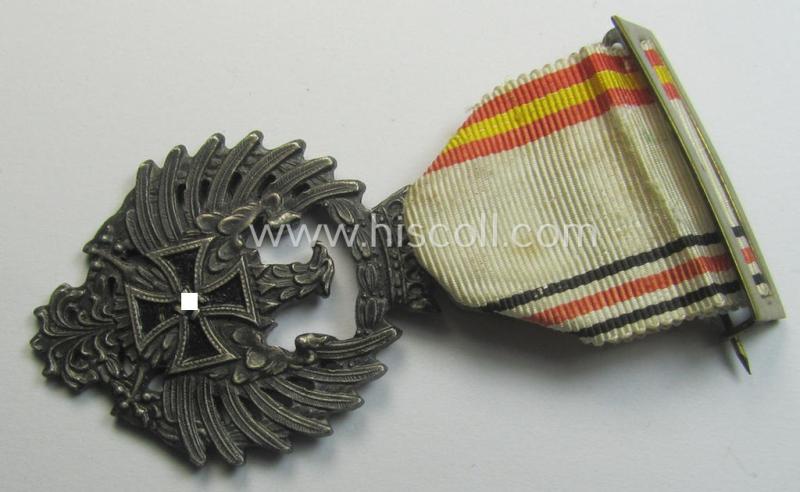 Attractive example of a Spanish-issued, campaign-medal of the Spanish Blue Division in Russia called: 'Medalla Conmemorativa Division Azul - Medalla de Tropa 1941' that comes mounted on its (typically Spanish) mounted ribbon as issued and/or worn