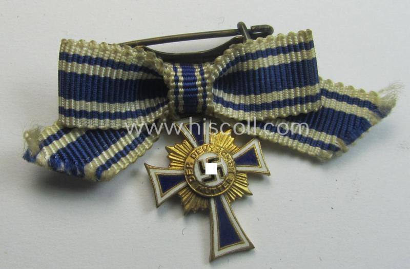 Miniature of an: 'Ehrenkreuz der deutschen Mutter - erste Stufe' (or: golden-class mothers'-cross) being a non-maker-marked example that comes in an overall nice- (albeit moderately worn- ie. used-), condition