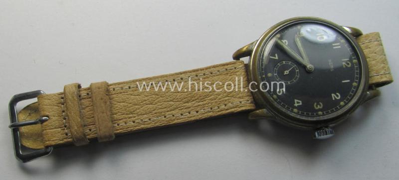 Attractive - and scarcely encountered! - WH (Heeres, LW etc.) WWII-period wrist-watch (or: 'Dienstuhr') of the make: 'Berg' having a black-coloured dial-plate and showing a number: '728016' on its back (and that comes in still running condition)