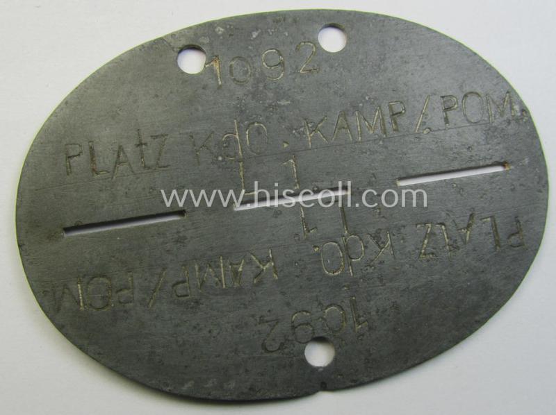 Unusual - and typical zinc-based - (I deem) WH (Luftwaffe) related ID-disc (ie. 'Erkennungsmarke') bearing the stamped unit-designation that simply reads: 'Platz Kdo. Kamp/Pom. L1' and that comes as issued and/or worn