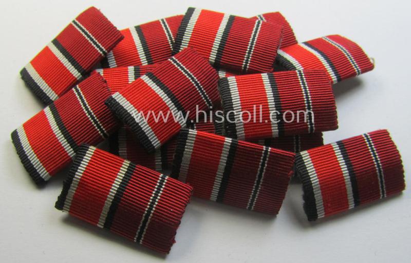 Neat - and simply never issued- nor worn! - dual-pieced WWII-period ribbon-bar (ie. 'Feld- o. Bandspange') as was intended for combination: 'Eisernes Kreuz II. Kl.' and: 'Ost'-medal (ie. 'Medaille Winterschlacht im Osten 1941-42')