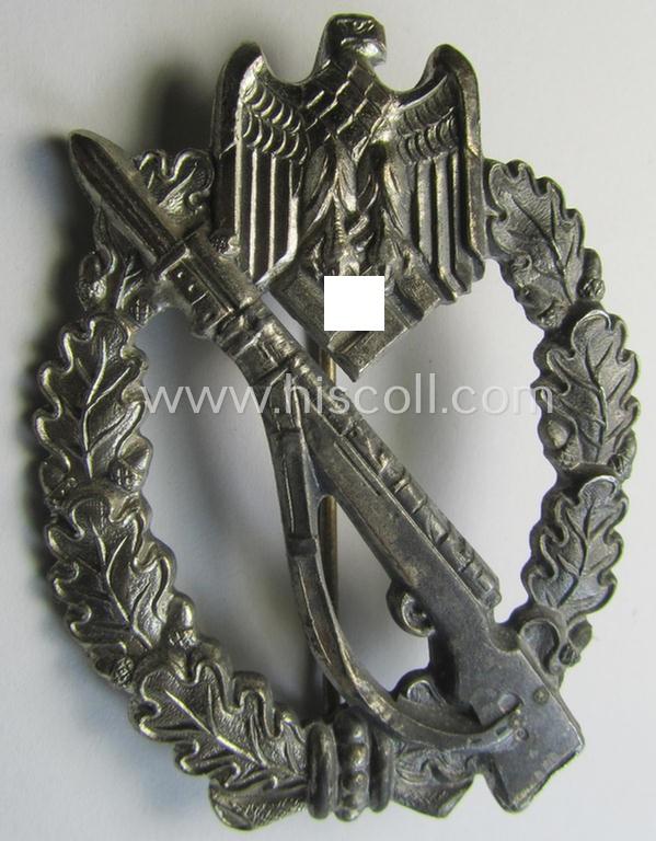 Attractive - and detailed! - 'Infanterie Sturmabzeichen in Silber' (or: silver-class infantry assault-badge ie. IAB) being a maker- (ie. 'S.H.u.C.o. 41'-) marked example as executed in silver-toned, zinc-based metal (ie. 'Feinzink')