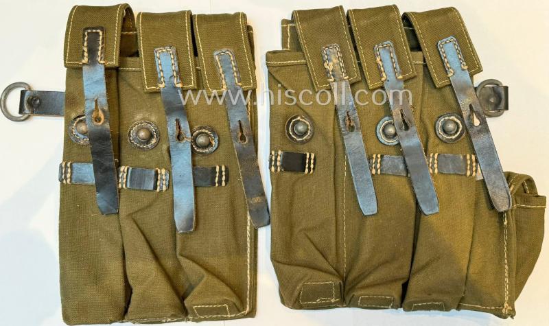 Superb - and nowadays rarely encountered! - pair of matching WH (Heeres ie. Waffen-SS etc.) greenish-coloured, so-called: MP38-40-pouches, which are both nicely maker-marked: 'CLG 43' and bearing a: 'Waffenamt-Abnahme'-stamp