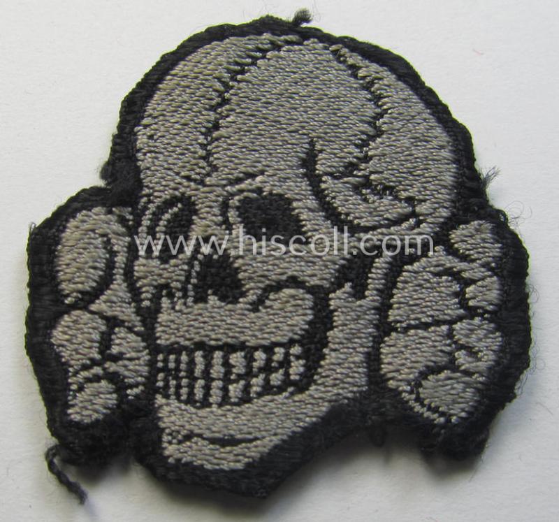 Superb - and nowadays truly rarely encountered! - Waffen-SS, 'BeVo'-woven-style skull (ie. 'Totenkopf für Schiffchen o. Einheitsfeldmütze') that comes in a minimally used-, condition