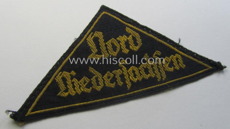 Attractive - and scarcely encountered! - 'HJ' ('Hitlerjugend') district-triangle (ie. 'Gebietsdreieck') entitled: 'Nord Niedersachsen' being a moderately used- ie. worn example that retains (most of) its period-attached 'RzM'-etiket