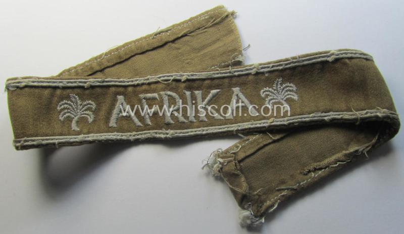 Attractive - and clearly worn! - WH cuff-title (ie. 'Ärmelstreifen') entitled: 'Afrika' (being a minimally shortened example that comes in an overall very nice- (ie. issued and clearly worn ie. once tunic-attached-), condition