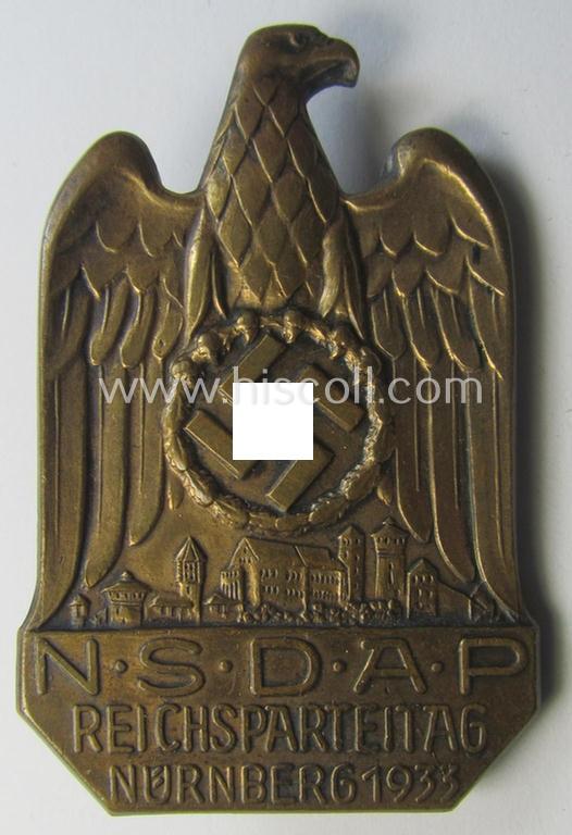 Attractive, N.S.D.A.P.-related 'tinnie' (ie. 'Tagungs- o. Veranstaltungsabzeichen'-) being a (typical) non-maker-marked- and/or golden-bronze-toned example showing the text: 'N.S.D.A.P. Reichsparteitag - Nürnberg 1933'