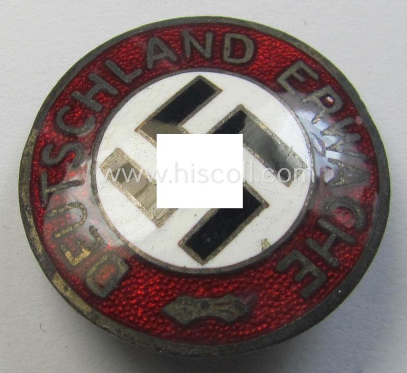 Superb - and neatly enamelled- (and bright-red-coloured!) - 'N.S.D.A.P.'-related supporter-pin (ie.: 'Parteiabzeichen') being a regular-sized- (and 'Ges.Gesch.'-marked) 'variant' bearing the text: 'Deutschland Erwache'