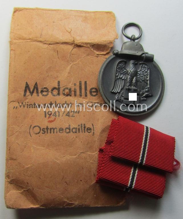 Maker- (ie. '30'-) marked medal: 'Winterschlacht im Osten 1941/42' in pouch by the: 'Hauptmünzamt Wien 40'