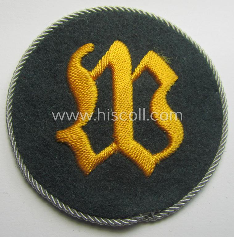 WH (Heeres) hand-embroidered trade- and/or special-career arm-insignia: 'geprüfter Wallmeister' (having a silver 'Kordel' attached)