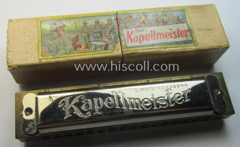 TR-era- (ie. 'Deutsche Wehrmacht'-) related harmonica entitled: 'Der Kapellmeister' that came stored in its original and/or carton-based box ie. etui