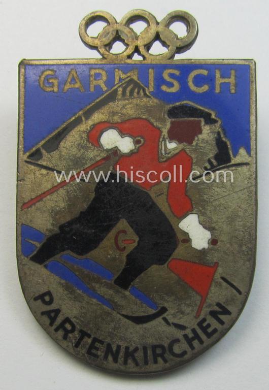 Commemorative 'Veranstaltungsabzeichen' (ie. 'tinnie') being a maker- (ie. 'Carl Poellath'-) marked example that is showing a sportsman on skis coupled with the text: 'Garmisch-Partenkirchen'