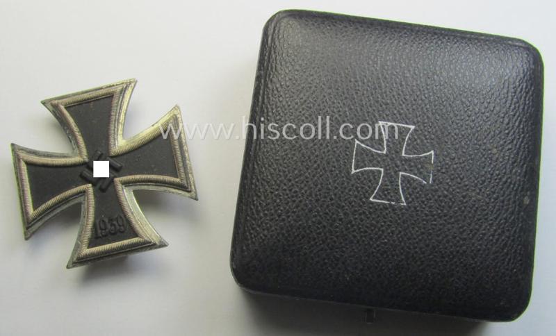 'Eisernes Kreuz 1. Klasse' (ie. Iron Cross 1st class) being an (I deem) mid-war-period produced: 'L/52'- (ie. by 'C.F. Zimmermann'-marked-) example and that comes complete in its specific etui