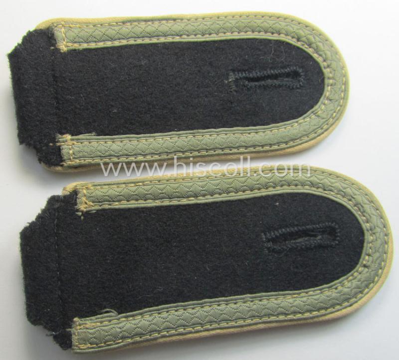 Pair of Waffen-SS NCO-type shoulderstraps as piped in the white-coloured branchcolour as was intended for usage by an: 'SS-Unterscharführer' who served within the: 'Waffen-SS Infanterie-Trpn.'