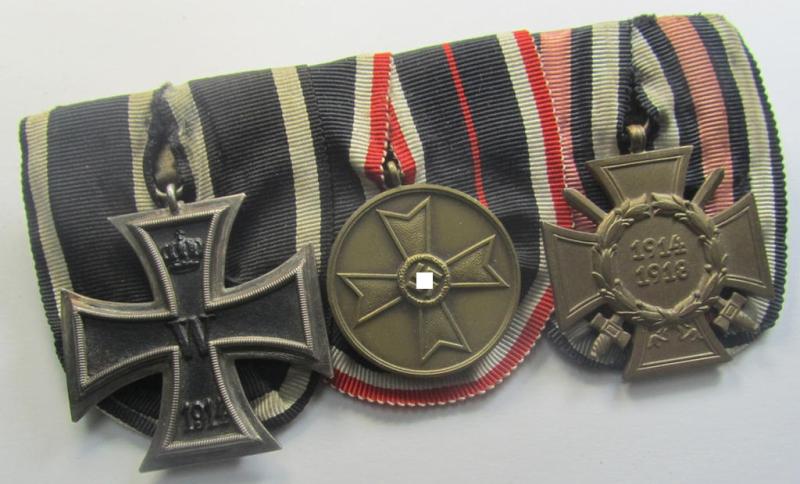 3-pieced 'WWI'- (ie. TR-) related medal-bar (ie. 'Ordenspange') resp. depicting a WWI-period: 'EK II.Kl.', a: 'KvK Medaille 1939' and a: a: 'FKK 1914-18 mit Schwn.'