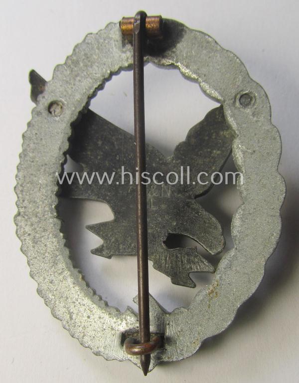 Damaged, WH (Luftwaffe) 'Fliegerschützen-Abzeichen mit Blitzbündel' being a neatly maker- (ie. 'B&N - L.'-) marked- and/or: typical zinc- (ie. 'Feinzink'-) based example as was produced by the: 'Berg & Nolte'-company