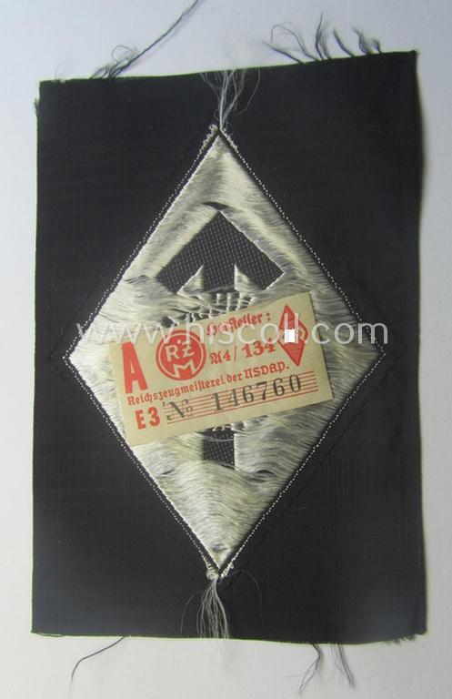 HJ- (ie. 'Hitlerjugend') 'Leistungsabzeichen in Silber in Stoff' that retains its 'RzM'-etiket