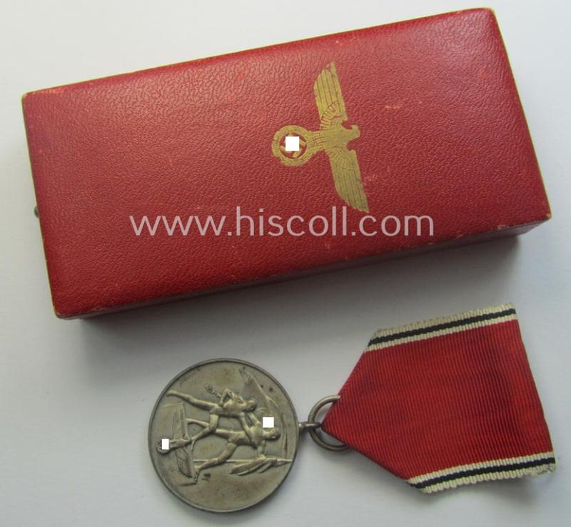 WH Austrian-occupation- (ie. 'Anschluss'-) medal: '1. März 1938' being a very attractive (and hardly tarnished) example that comes stored in its bright-red-coloured- and/or typical non-maker-marked etui as issued