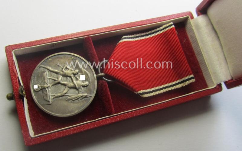 WH Austrian-occupation- (ie. 'Anschluss'-) medal: '1. März 1938' being a very attractive (and minimally tarnished) example that comes stored in its bright-red-coloured- and/or nicely maker-marked etui as issued