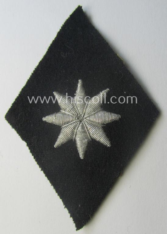 Attractive - and rarely found! - Waffen-SS, officers'-pattern, hand-embroidered sleeve-insignia (ie. 'Ärmelraute') for an: 'SS-Führer im Verwaltungsdienst' still retaining its period 'RzM'-etiket