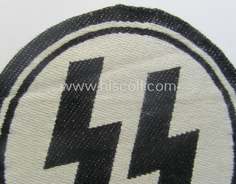 Waffen-SS sport-shirt emblem as executed in the neat 'BeVo'-weave pattern that is void of an: 'RzM'-etiket and that comes in an overall nice- (ie. moderately used- ie. tunic-attached-), condition