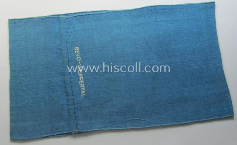 Light-blue-coloured and neatly 'BeVo'-woven, so-called: RLB (or: 'Reichsluftschutzbund') 'Amtsträger'-armband depicting the typical 'RLB'-logo (without lettering) and showing an interwoven makers'-designation (ie. 'BeVo - Wuppertal')