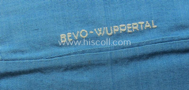 Light-blue-coloured and neatly 'BeVo'-woven, so-called: RLB (or: 'Reichsluftschutzbund') 'Amtsträger'-armband depicting the typical 'RLB'-logo (without lettering) and showing an interwoven makers'-designation (ie. 'BeVo - Wuppertal')
