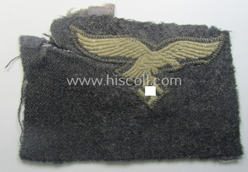 'Cut-out of a tunic' - WH (Luftwaffe) EM- (ie. NCO-) type breasteagle (ie. 'Brustadler für Mannschaften und Unteroffiziere der Luftwaffe')