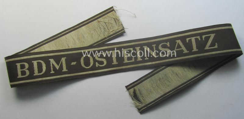 Superb - and actually rarely encountered! - example of the HJ/BDM- ('Hitlerjugend' ie. 'Bund Deutscher Mädel'-) cuff-title (ie. 'Ärmelstreifen') entitled: 'BDM-Osteinsatz' being an example as executed in the neat 'BeVo'-weave pattern