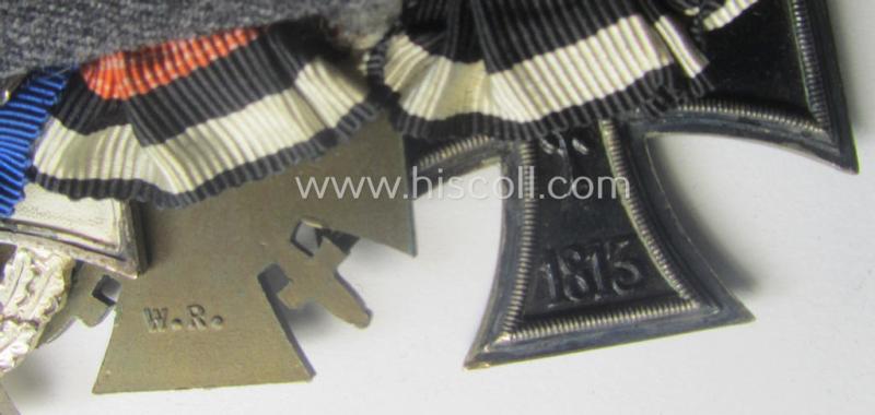 4-pieced, 'WWI'- (ie. TR-) related medal-bar (ie. 'Ordenspange') resp. depicting a WWI-period: 'EK II.Kl.', a: 'FKK 1914-18', a: 'TD-Ez. der 2. Kl.' and an Austrian WWI-commemorative medal