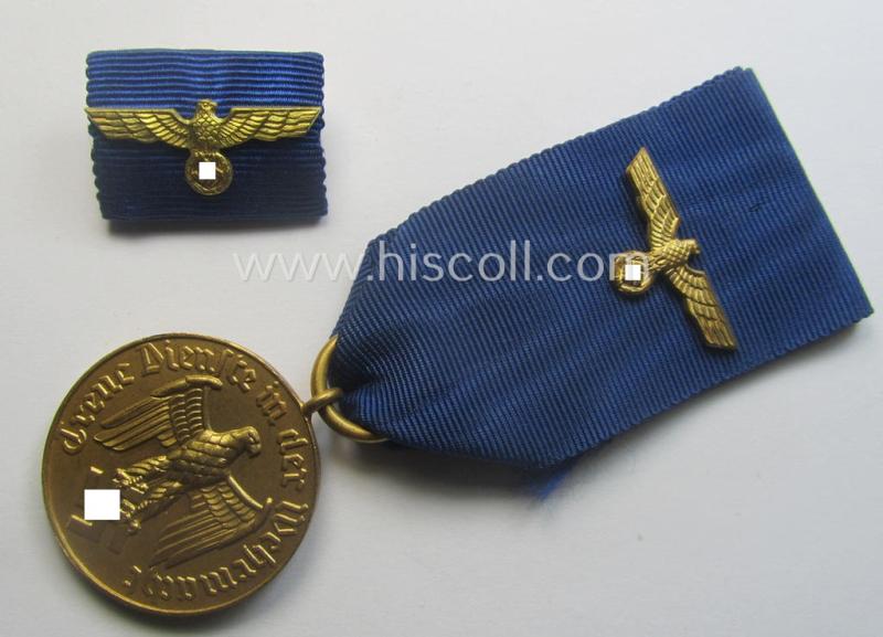 WH (Heeres o. KM) bright golden-toned 'WH-DA der 3. Klasse für 12 Jahre Dienstzeit' that comes mounted onto its ribbon (ie. 'Bandabschnitt') having a golden-toned eagle-device attached and that comes with its accompanying 'Feld- o. Bandspange'