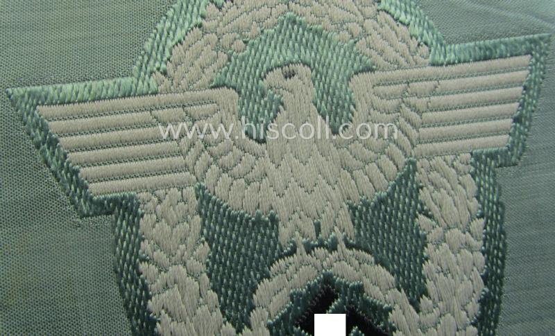 Police- (ie. 'Polizei'-) related armbadge (ie. arm-eagle) being a typical 'BeVo'-woven example