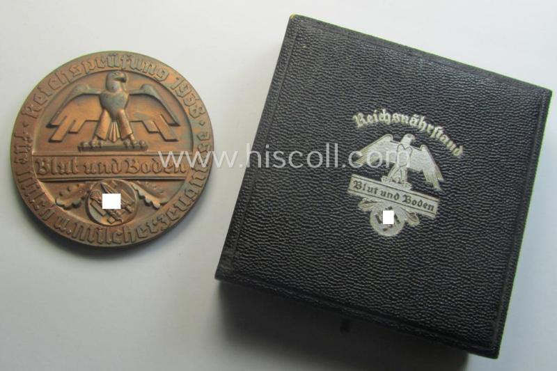 Reddish-bronze-toned, 'Reichsnährstand'- (ie. 'RNSt.'-) related, commemorative-award-plaque entitled: 'Reichsprüfung für Milch u. Milcherzeugnisse - Blut und Boden - 1938 - Sauermilch-Käse' and that comes stored in its period etui